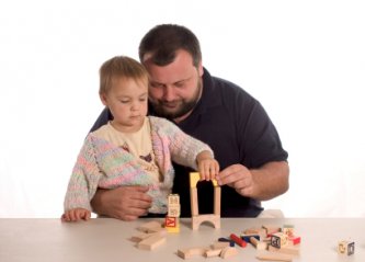 dad and son playing blocks