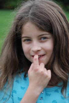 Girl biting her nails For kids bad habits are a kind of necessity, comfort,