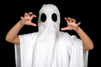 child playing ghost this halloween
