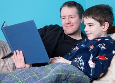 Creating Bedtime Rituals - Getting Kids to Bed the Easy Way 7 dad-reading-bedtime-story