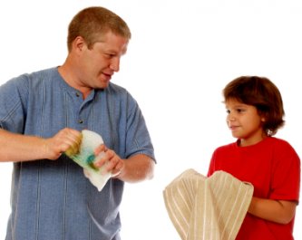 teaching responsibility by example - father and daughter doing chores together