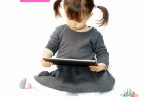 Too much screen time. Young Girl on Tablet