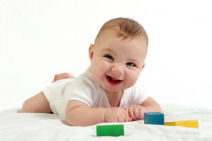 Fun Games to Encourage Your Baby's Development 7 baby playing small