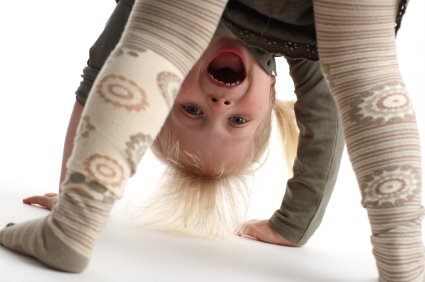 Milestones 24 to 36 Months from Toddler to Preschooler 7 little girl doing somersault