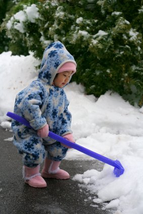 The Second Year - Baby Milestones 7 playing in snow
