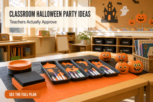Classroom Halloween party ideas laid out on an elementary classroom table with orange and black paper coverings, stacked craft trays and decorated mini pumpkins in warm afternoon light