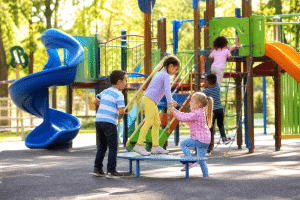 encouraging social skills in kids children playing together on playground