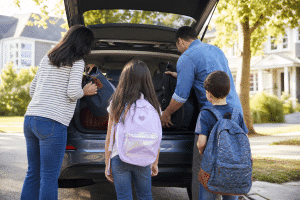 budget family vacation tips for parents packing up for an affordable family road trip