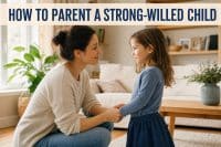 Strong Willed, Not Difficult — How to Parent a Strong Willed Child Without the Power Struggles 1 how to parent a strong willed child: a calm parent kneeling to talk with a determined young child at eye level