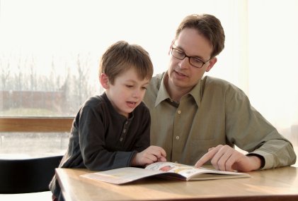 Creating a Positive Reading Environment at Home! 7 father and son reading a book