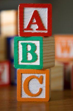 Creative Ways to Teach Your Child the Alphabet 8 learning the alphabet with alphabet blocks