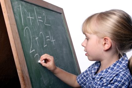 Homeschooling and the 7 Common Mistakes When Teaching Math 7 young girl doing her sums