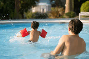 kids pool safety tips for families enjoying summer swimming together