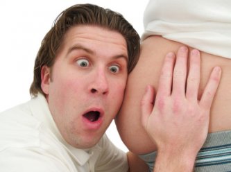 Tips for Expectant Dads 8 expectant dad felling his baby kick for the first time