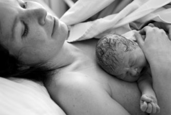 Understanding the Use of Forceps or Vacuum Extraction 8 newborn and exhausted mom - baby born less than a minute from time of picture