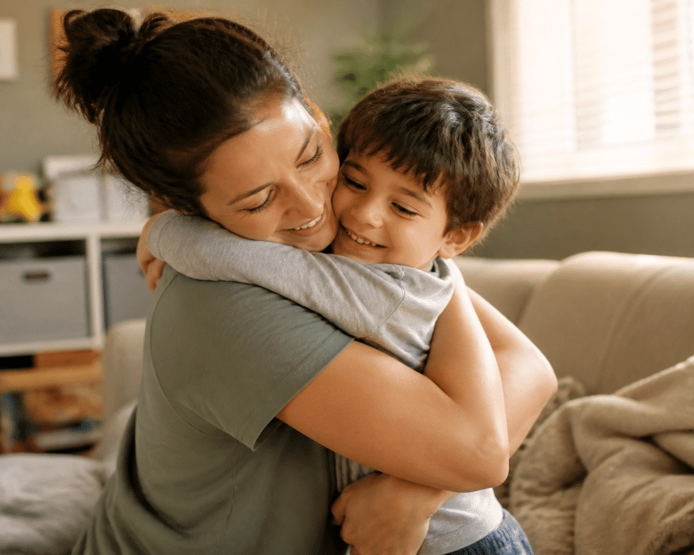 Reward chart for kids — parent rewarding child with a hug