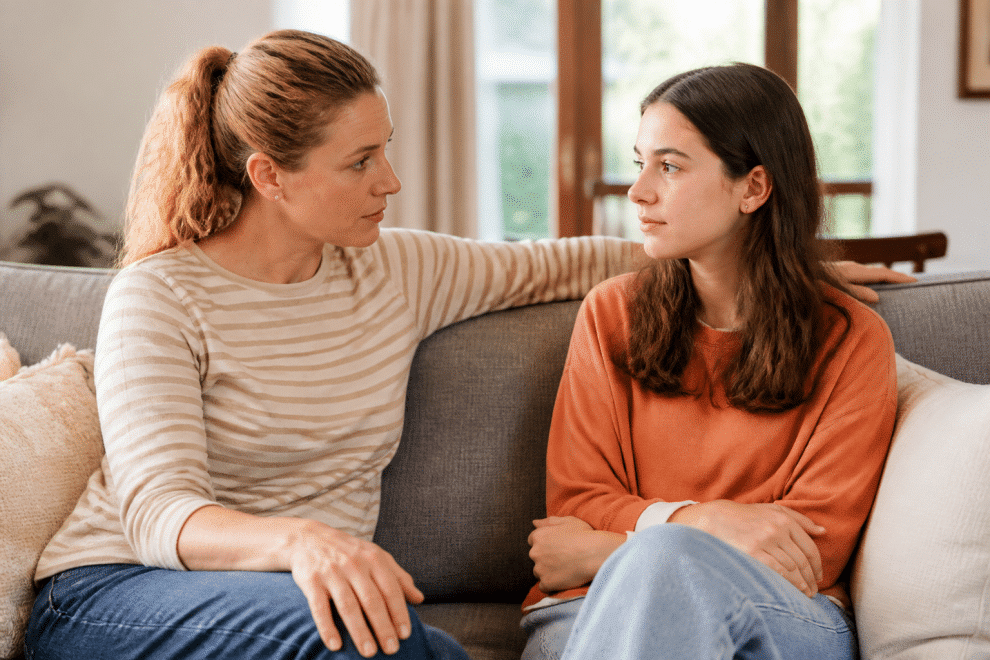 teen dating violence prevention — parent talking with teen about healthy relationships
