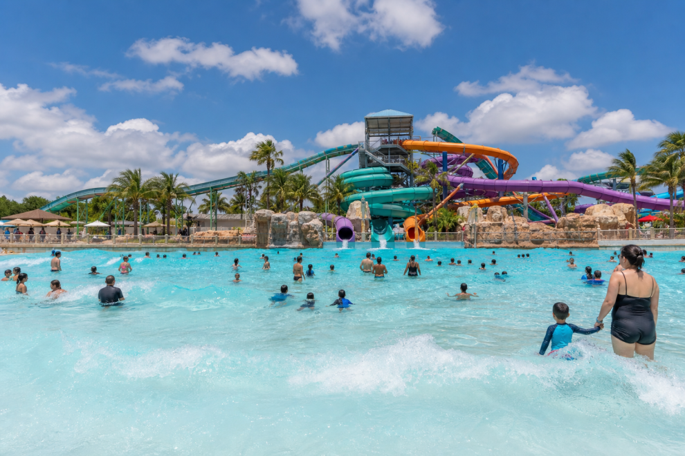 Best water parks for families — sunny outdoor waterpark with colorful slides