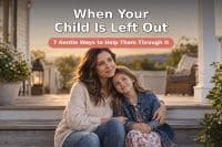 A warm mother sitting close beside her school-age child on the front steps at golden hour, one arm around them as the child leans in, both faces gentle and connected, with a legible baked-in headline "When Your Child Is Left Out" and subline "7 Gentle Ways to Help Them Through It" — a tender, hopeful scene about comforting a child who feels excluded